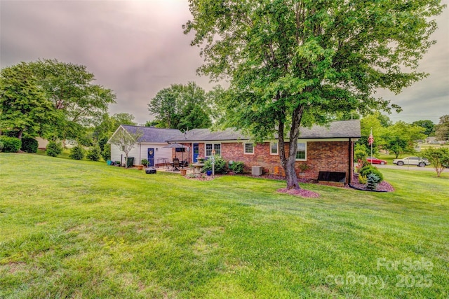 800 Sunset Rd, Cherryville, NC 28021 - back of house with a yard, cooling unit, and brick siding