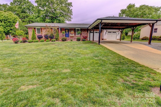 800 Sunset Rd, Cherryville, NC 28021 - view of front of house featuring a carport, a front lawn, concrete driveway, an attached garage, and brick siding