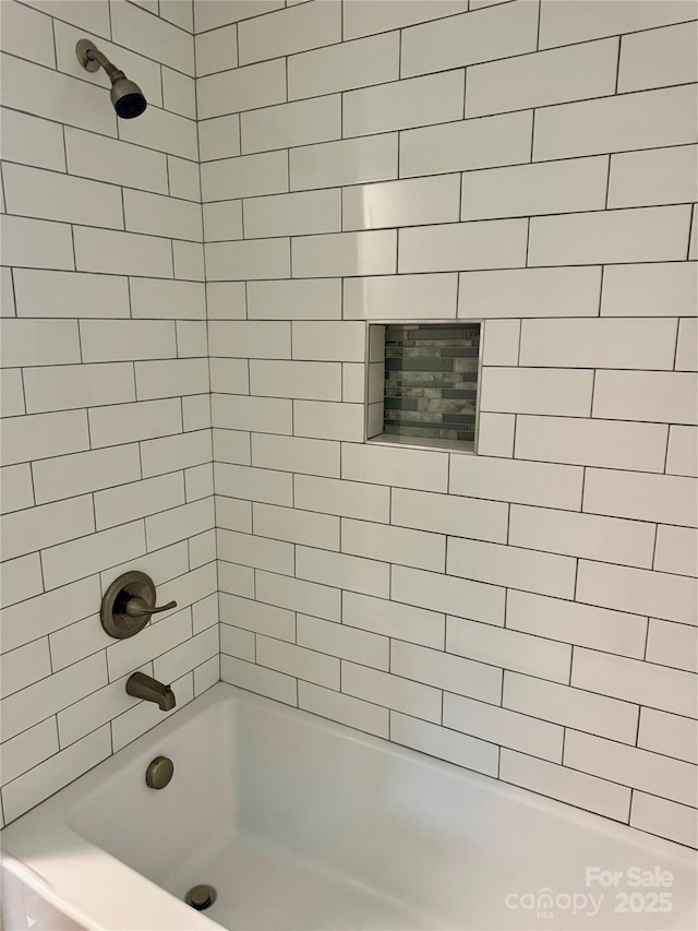 full bathroom with shower / tub combination