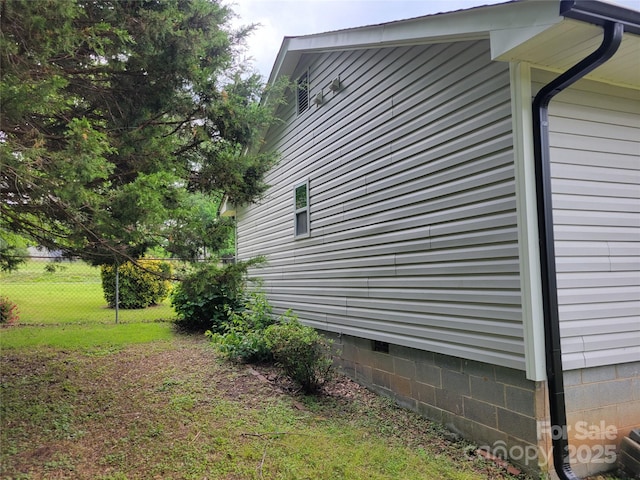 view of side of home with crawl space