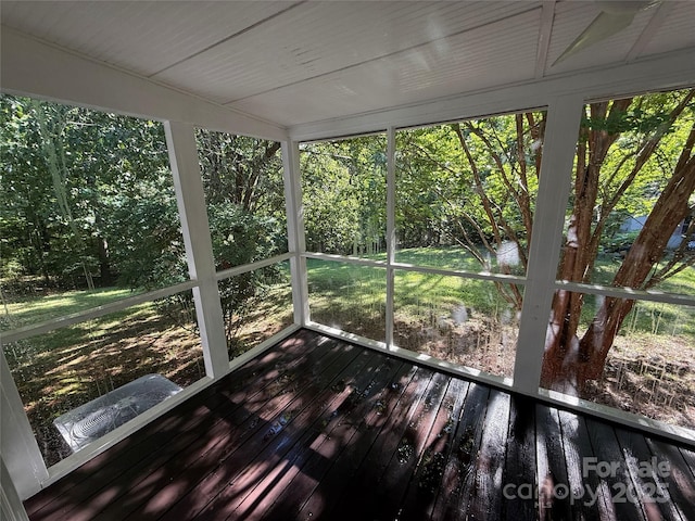 unfurnished sunroom with plenty of natural light