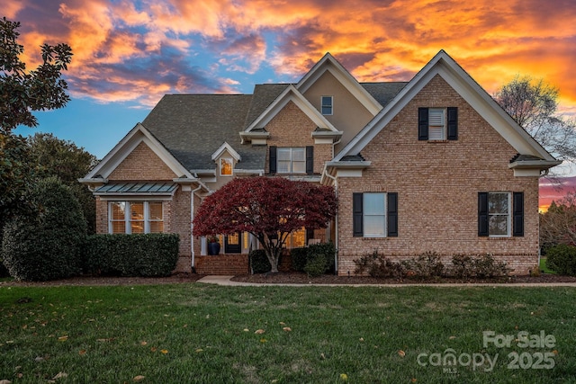 18823 Peninsula Cove Ln, Cornelius, NC 28031 - traditional home featuring a yard and brick siding