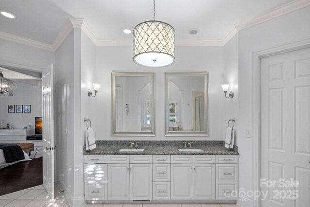 18823 Peninsula Cove Ln, Cornelius, NC 28031 - full bath featuring double vanity, tile patterned floors, ornamental molding, ensuite bath, and baseboards