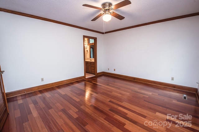 unfurnished room with wood finished floors, a ceiling fan, baseboards, a textured ceiling, and ornamental molding
