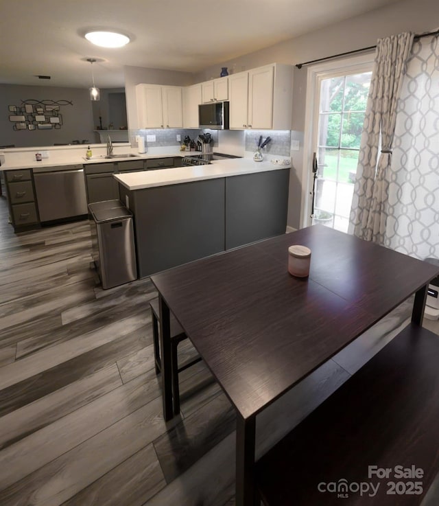dining room with wood finished floors