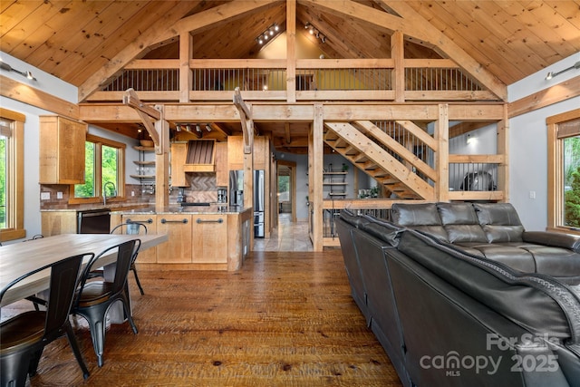 55 Maynards Way, Hendersonville, NC 28792 - kitchen with open floor plan, dishwashing machine, high vaulted ceiling, light brown cabinets, and healthy amount of natural light