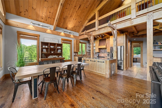 55 Maynards Way, Hendersonville, NC 28792 - dining room with wooden ceiling, baseboards, light wood-type flooring, and high vaulted ceiling