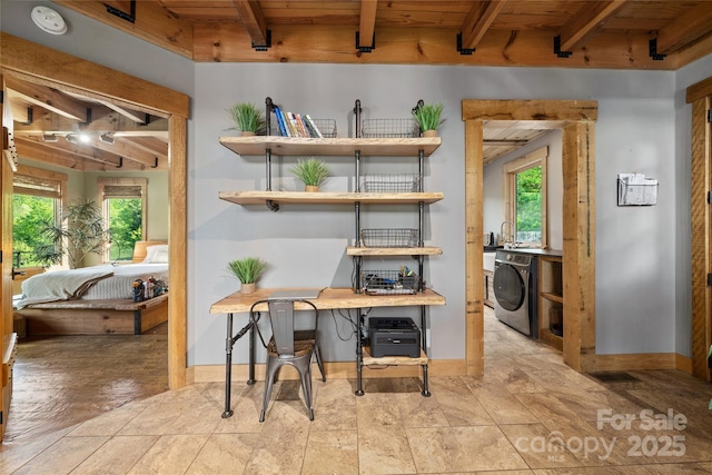 55 Maynards Way, Hendersonville, NC 28792 - office area featuring beam ceiling, baseboards, wood ceiling, and washing machine and clothes dryer