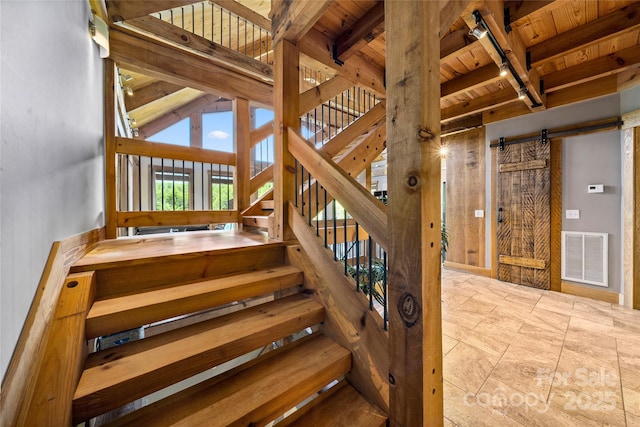 55 Maynards Way, Hendersonville, NC 28792 - stairway featuring wood ceiling, beamed ceiling, and a barn door