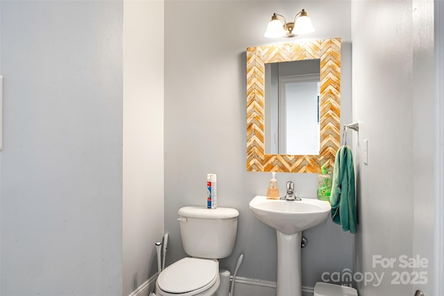 10452 Quiet Bay Ct, Charlotte, NC 28278 - half bathroom featuring toilet and a sink