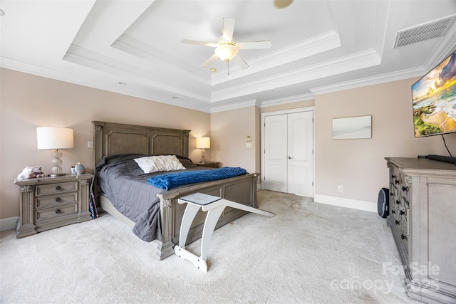 10452 Quiet Bay Ct, Charlotte, NC 28278 - bedroom featuring a tray ceiling, light colored carpet, ornamental molding, baseboards, and ceiling fan