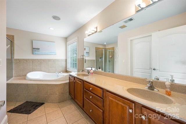10452 Quiet Bay Ct, Charlotte, NC 28278 - full bathroom featuring tile patterned floors, a bath, a shower stall, and double vanity