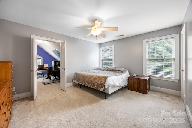 10452 Quiet Bay Ct, Charlotte, NC 28278 - bedroom featuring multiple windows, light carpet, baseboards, and vaulted ceiling
