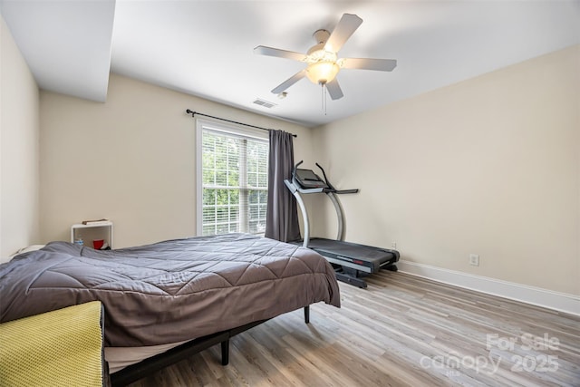 10452 Quiet Bay Ct, Charlotte, NC 28278 - bedroom with wood finished floors, baseboards, and ceiling fan