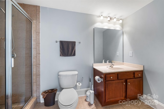 10452 Quiet Bay Ct, Charlotte, NC 28278 - bathroom featuring toilet, vanity, a stall shower, and tile patterned flooring