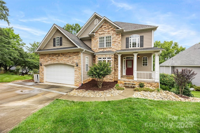 10452 Quiet Bay Ct, Charlotte, NC 28278 - view of front facade featuring stone siding, a porch, driveway, and a front yard