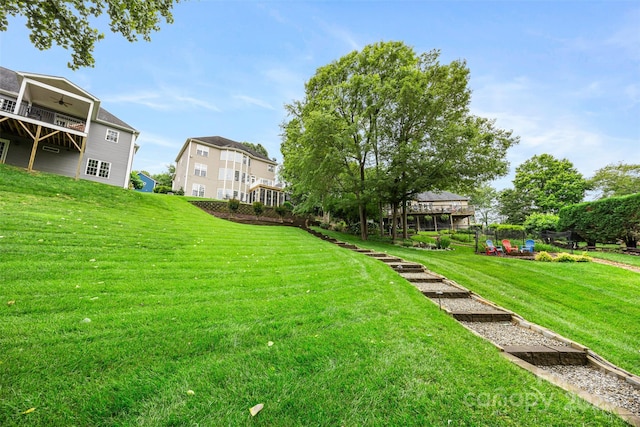 10452 Quiet Bay Ct, Charlotte, NC 28278 - view of grassy yard featuring a ceiling fan