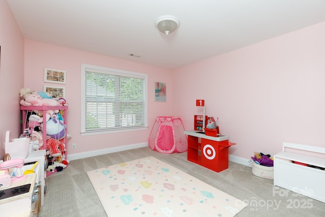 playroom featuring baseboards, visible vents, and carpet