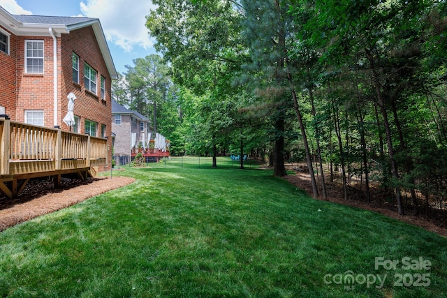 view of yard with a deck