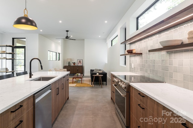 129 English Dr, Candler, NC 28715 - kitchen featuring appliances with stainless steel finishes, open shelves, a sink, backsplash, and finished concrete flooring