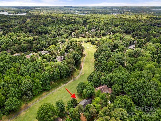 aerial view of property's location with a forest
