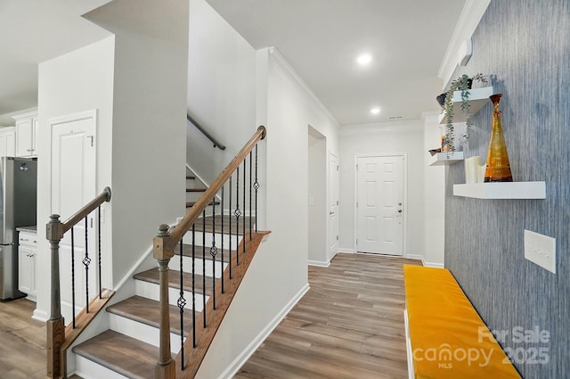 1360 Dali Blvd, Mount Holly, NC 28120 - foyer featuring light wood-type flooring, ornamental molding, baseboards, stairway, and recessed lighting
