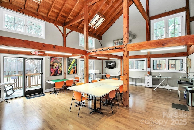 1360 Dali Blvd, Mount Holly, NC 28120 - dining space featuring hardwood / wood-style flooring, high vaulted ceiling, baseboards, and wood ceiling with exposed beams