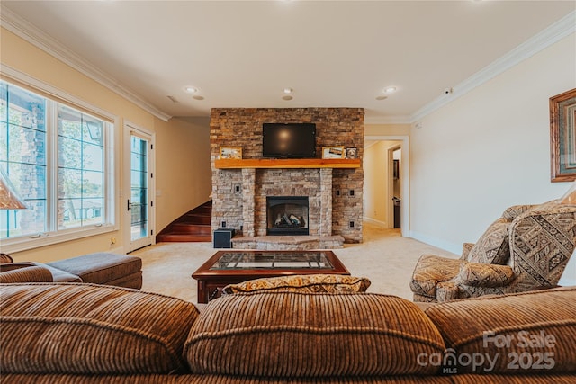living area featuring light carpet, crown molding, baseboards, a stone fireplace, and recessed lighting