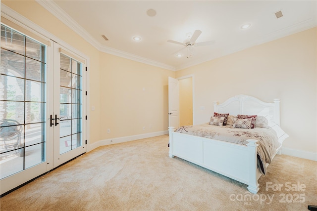 bedroom featuring light colored carpet, ornamental molding, multiple windows, baseboards, and french doors