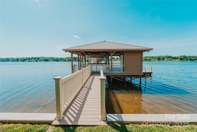 dock area with a water view