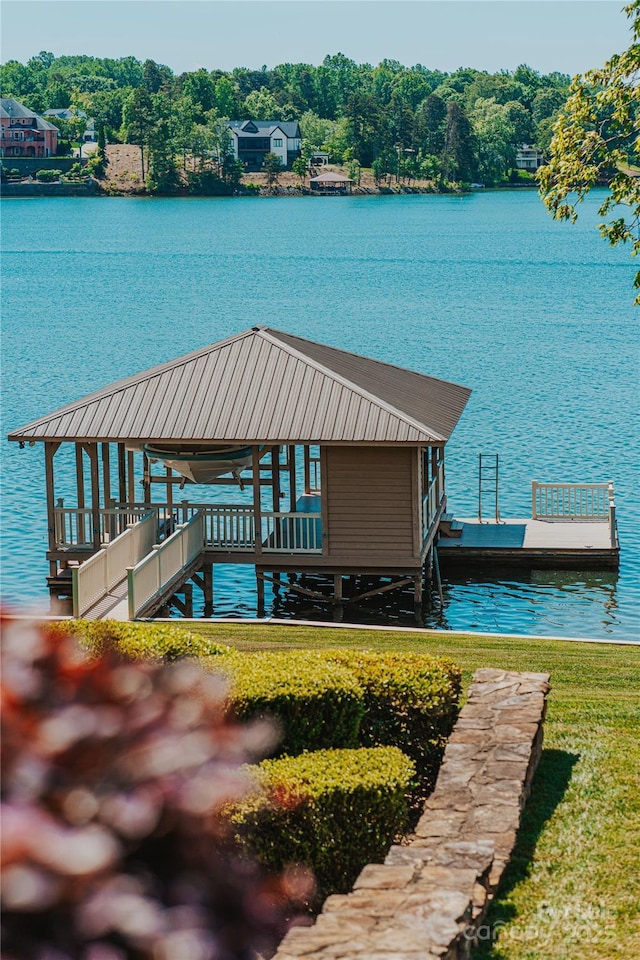 dock area featuring a water view