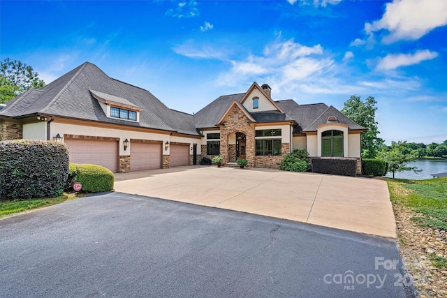 6205 Plantation Pointe Dr, Granite Falls, NC 28630 - view of front of property with stone siding, driveway, and stucco siding
