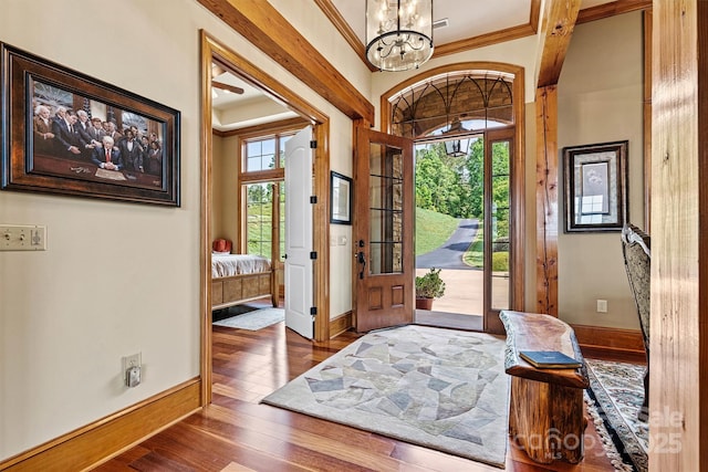 6205 Plantation Pointe Dr, Granite Falls, NC 28630 - foyer with a chandelier, hardwood / wood-style flooring, ornamental molding, and baseboards