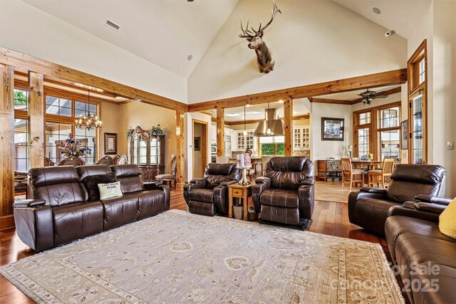 6205 Plantation Pointe Dr, Granite Falls, NC 28630 - living area with a chandelier, wood finished floors, ceiling fan, and high vaulted ceiling