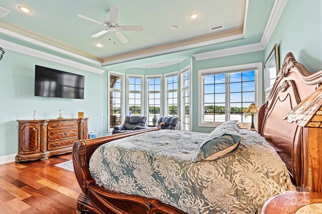 6205 Plantation Pointe Dr, Granite Falls, NC 28630 - bedroom with a raised ceiling, ornamental molding, wood finished floors, recessed lighting, and ceiling fan
