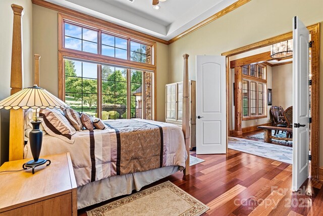 6205 Plantation Pointe Dr, Granite Falls, NC 28630 - bedroom featuring wood finished floors and ornamental molding