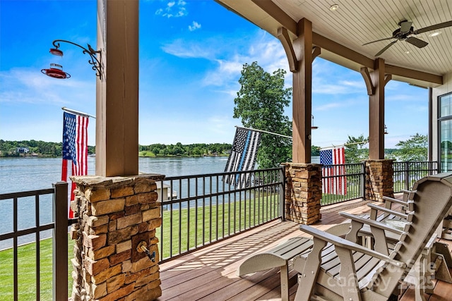 6205 Plantation Pointe Dr, Granite Falls, NC 28630 - deck featuring a water view, a ceiling fan, and a lawn
