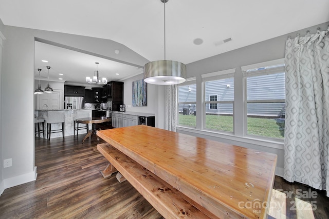2015 Knocktree Dr, Indian Trail, NC 28079 - dining space featuring a chandelier, dark wood-style flooring, lofted ceiling, baseboards, and recessed lighting