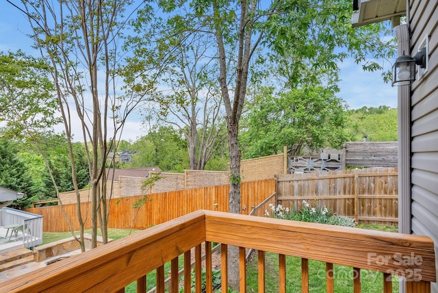 11 Louisville Pl, Asheville, NC 28806 - wooden deck with a fenced backyard