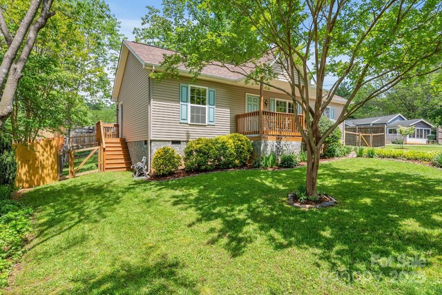 11 Louisville Pl, Asheville, NC 28806 - rear view of house featuring a shingled roof and crawl space