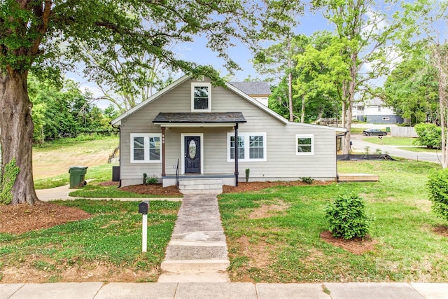 225 N Lee St, Mount Holly, NC 28120 - bungalow-style house with a front lawn