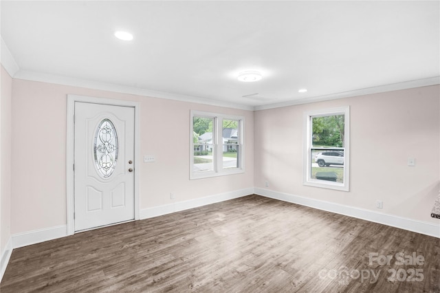 225 N Lee St, Mount Holly, NC 28120 - entryway featuring wood finished floors, crown molding, baseboards, and recessed lighting