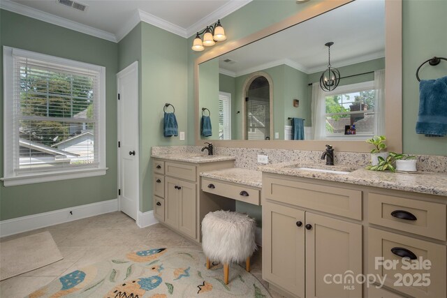 full bathroom with vanity, baseboards, crown molding, tile patterned flooring, and a chandelier