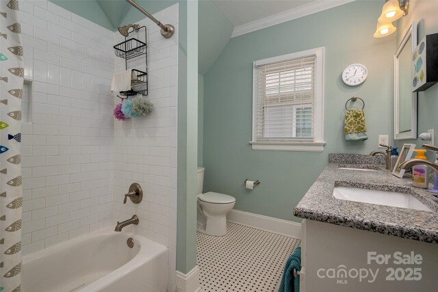 bathroom with baseboards, crown molding, toilet, shower / bath combination with curtain, and double vanity