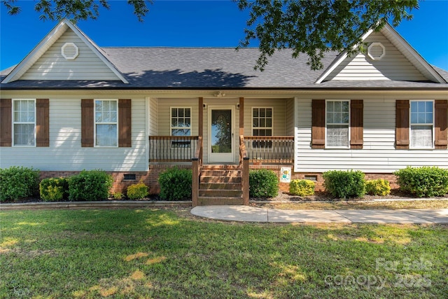 view of front of house with crawl space, a front lawn, a porch, and roof with shingles