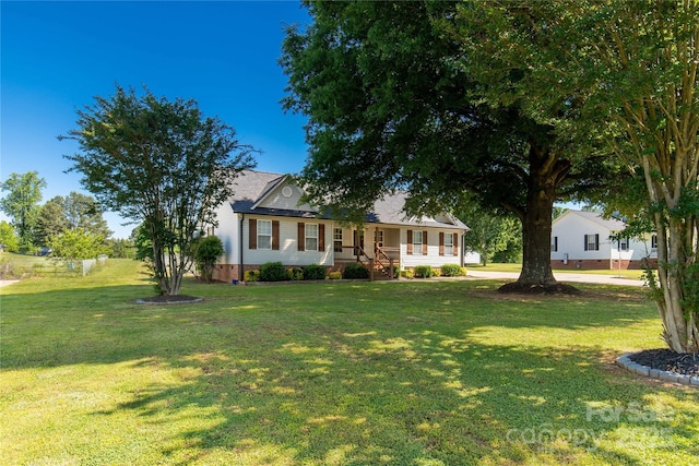 single story home featuring covered porch, a front lawn, and crawl space