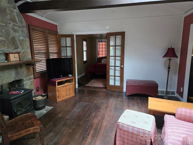 living area with hardwood / wood-style flooring, french doors, ornamental molding, visible vents, and vaulted ceiling with beams