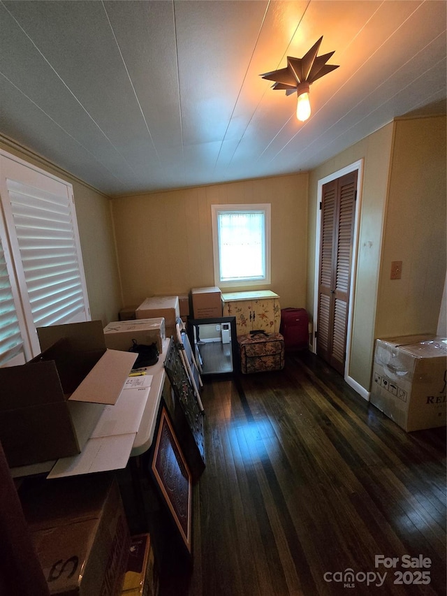 bedroom featuring wood-type flooring