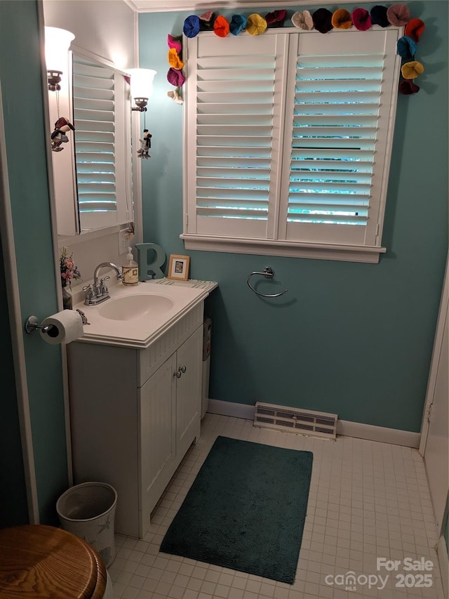132 Sycamore Ter, Arden, NC 28704 - bathroom featuring vanity, tile patterned floors, and baseboards
