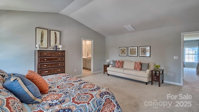 carpeted bedroom with connected bathroom, visible vents, baseboards, and lofted ceiling